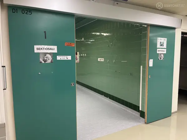 Sähköinen liukuovi (nro 21) tila D1 Leikkaussalit 024