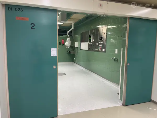 Sähköinen liukuovi (nro 27) tila D1 Leikkaussalit 026